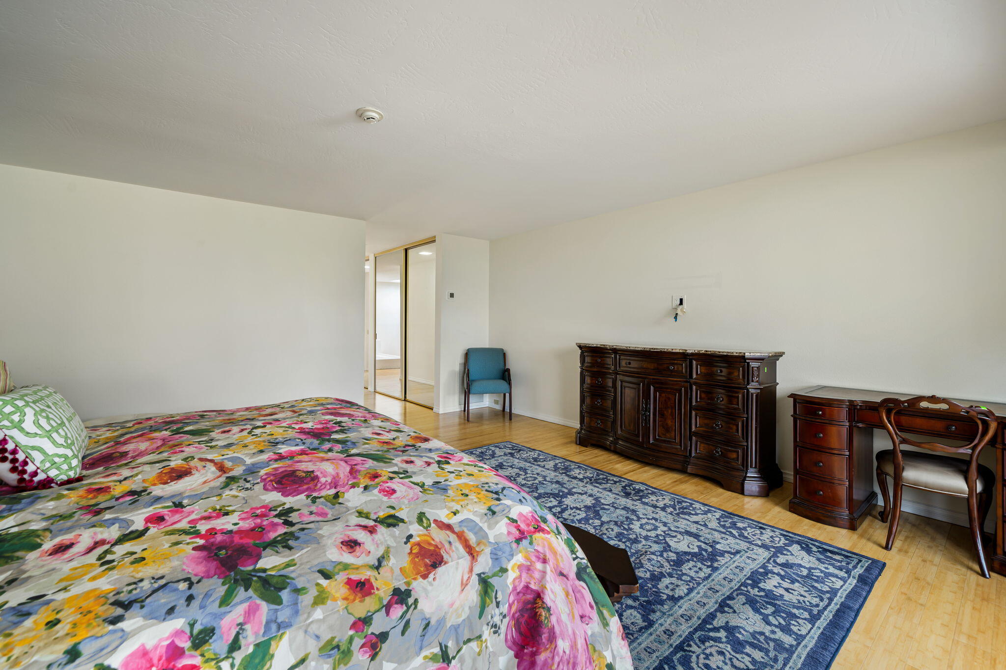 1 Rutgers Court Rancho Mirage, CA 92270 - Photo 16 of 37 a bedroom with a bed and a dresser in it