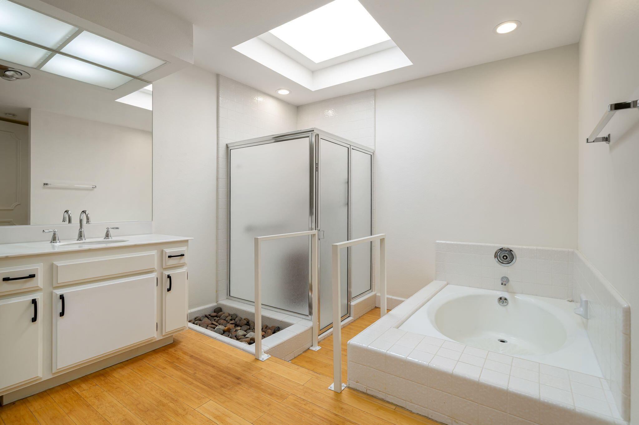 1 Rutgers Court Rancho Mirage, CA 92270 - Photo 18 of 37 a bathroom with a tub sink and mirror