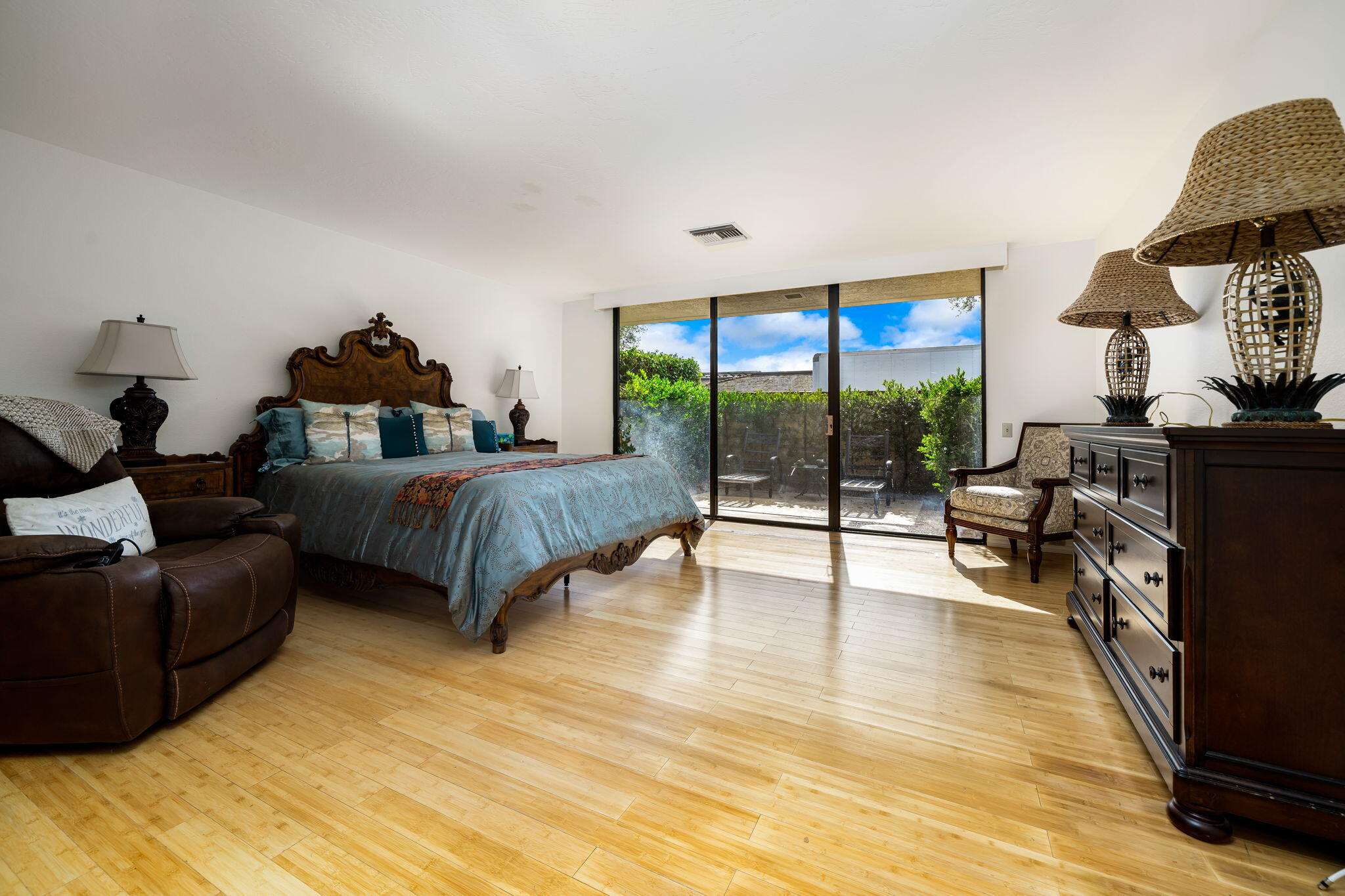 1 Rutgers Court Rancho Mirage, CA 92270 - Photo 20 of 37 a living room with furniture and a floor to ceiling window