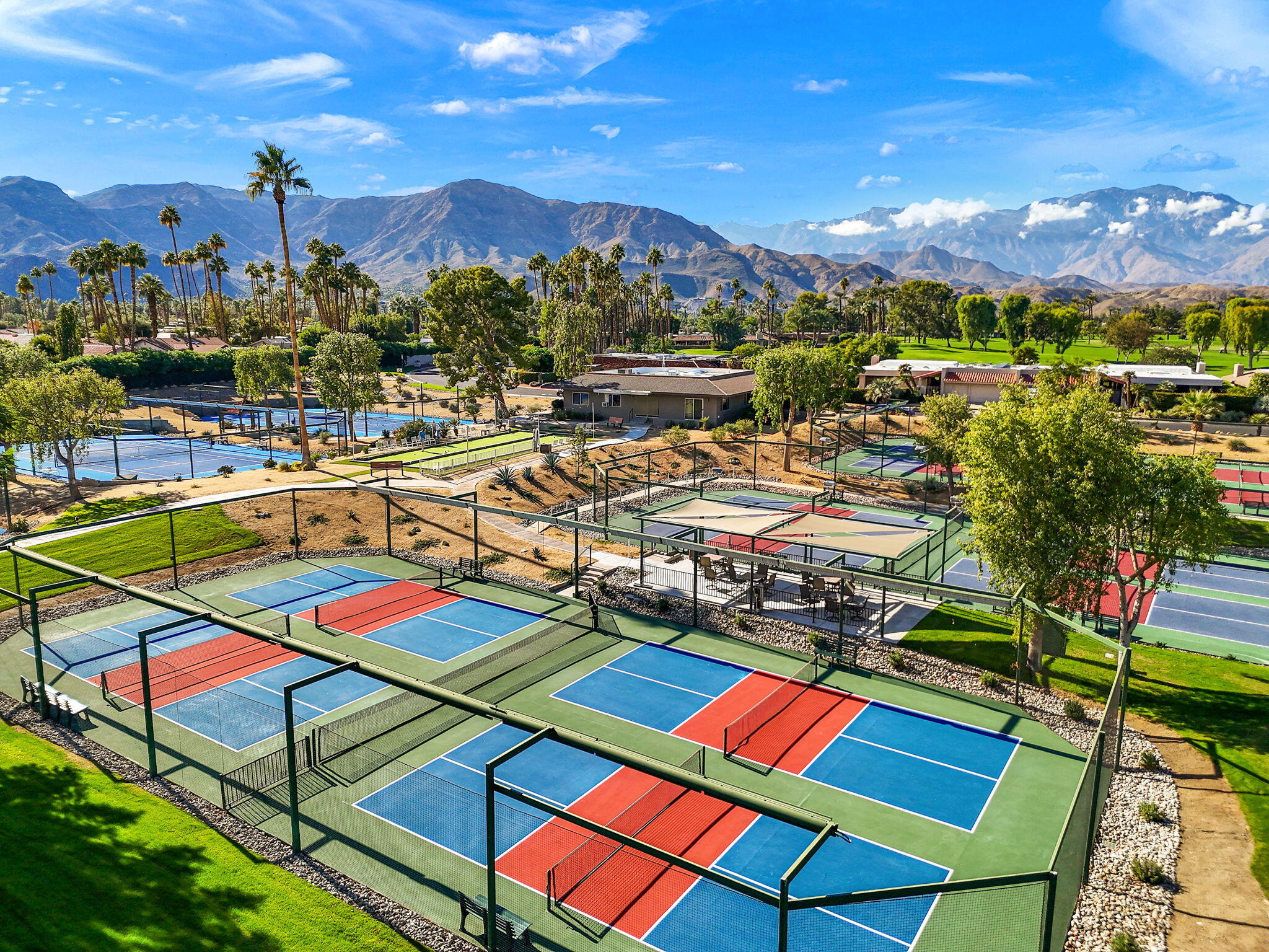 1 Rutgers Court Rancho Mirage, CA 92270 - Photo 34 of 37 a view of a swimming pool with outdoor seating