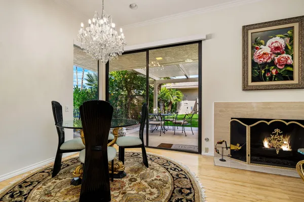 a view of a livingroom with furniture and a fireplace