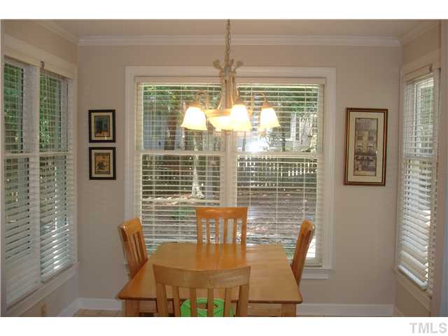 9105 Doublebit Drive Raleigh, NC 27615 - Photo 2 of 20 Spacious breakfast nook that was added onto for more space. This addition makes the kitchen area even more spacious. There is terrific natural light throughout the home. New light fixture.