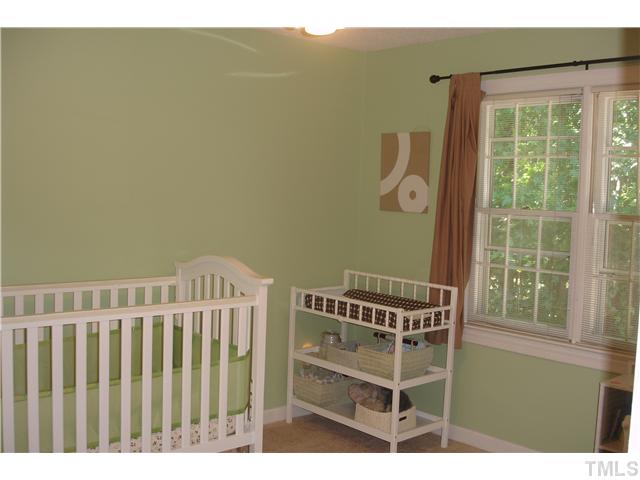 9105 Doublebit Drive Raleigh, NC 27615 - Photo 9 of 20 Bedroom #2 with a large closet and double windows.