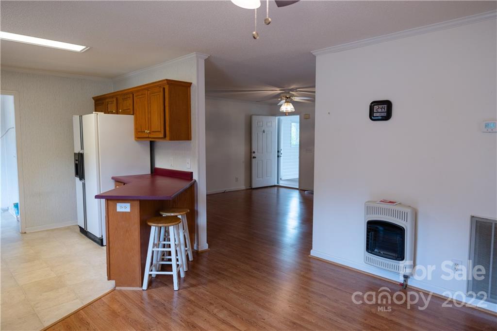 5040 Tabernacle Road Lancaster, SC 29720 - Photo 12 of 26 a view of a livingroom with furniture and wooden floor