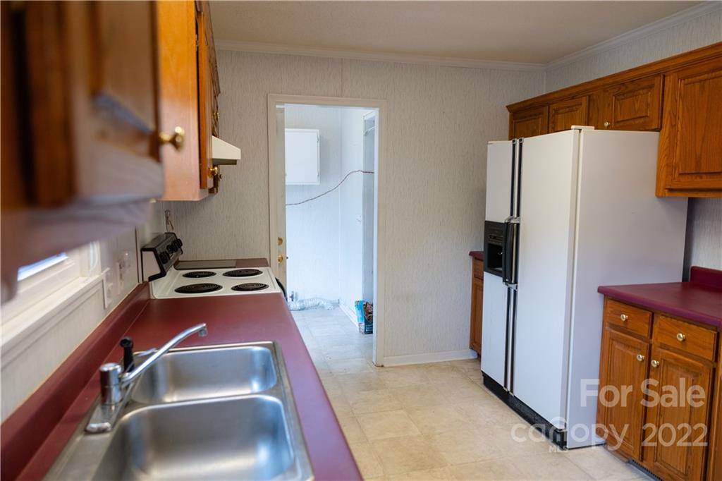 5040 Tabernacle Road Lancaster, SC 29720 - Photo 14 of 26 a room with storage and utility