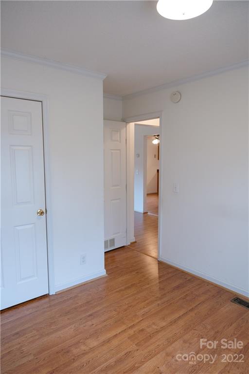 5040 Tabernacle Road Lancaster, SC 29720 - Photo 20 of 26 a view of an empty room and wooden floor