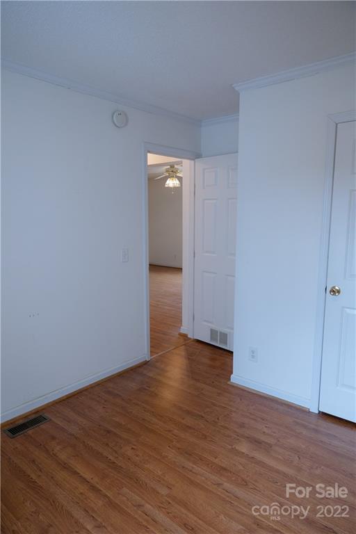 5040 Tabernacle Road Lancaster, SC 29720 - Photo 22 of 26 a view of an empty room with wooden floor