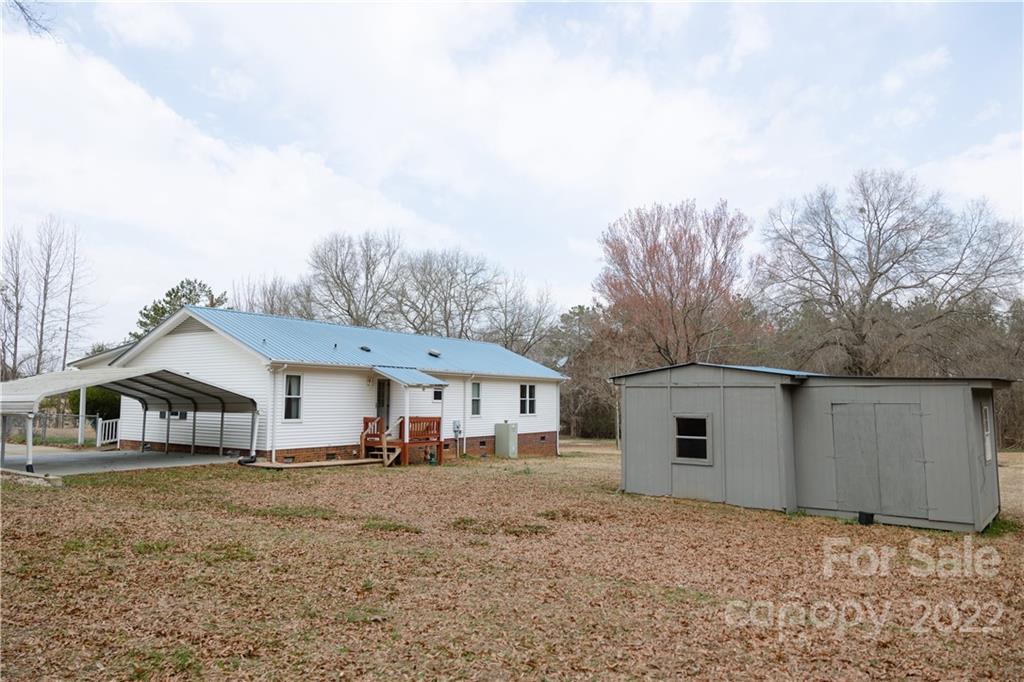 5040 Tabernacle Road Lancaster, SC 29720 - Photo 24 of 26 a front view of a house with a yard