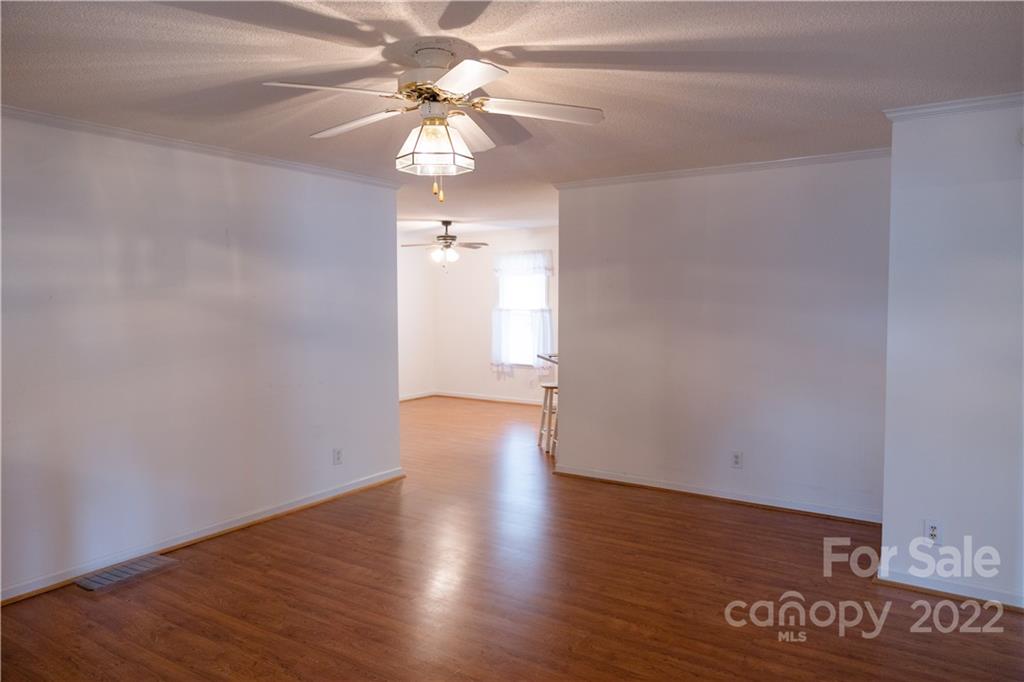 5040 Tabernacle Road Lancaster, SC 29720 - Photo 5 of 26 wooden floor in an empty room
