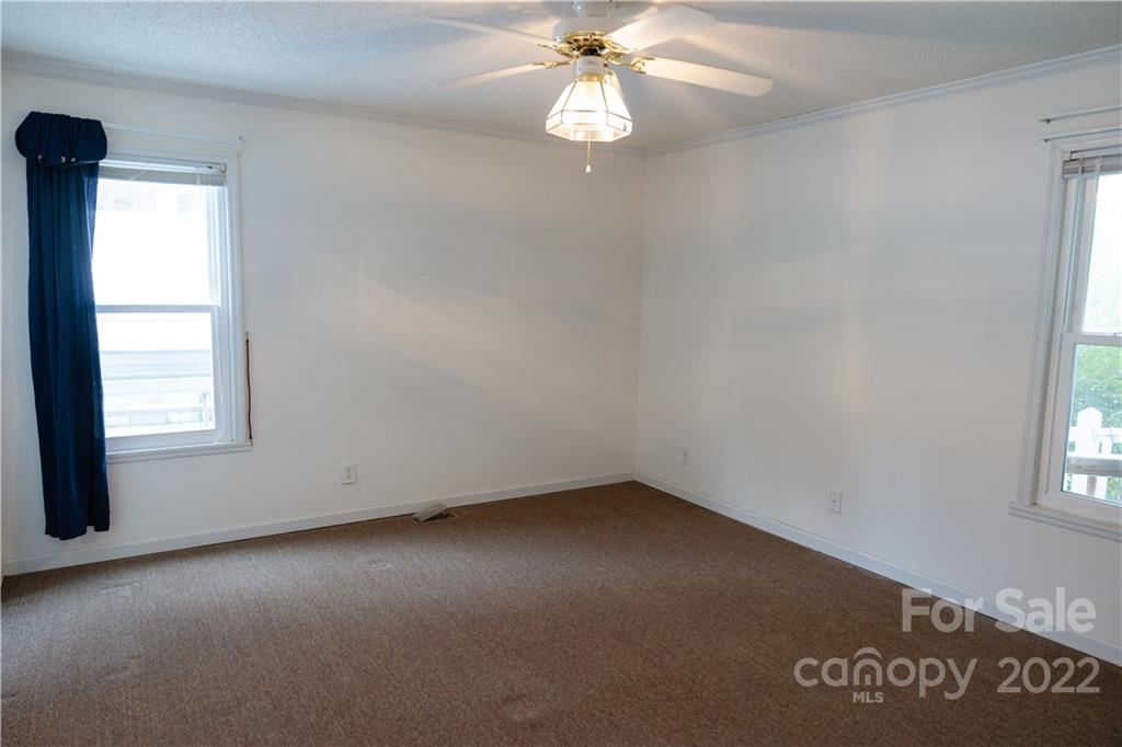 5040 Tabernacle Road Lancaster, SC 29720 - Photo 6 of 26 an empty room with a window