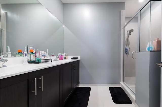 a kitchen with a refrigerator stove and microwave