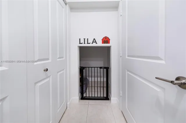 a bathroom with a granite countertop toilet and a shower