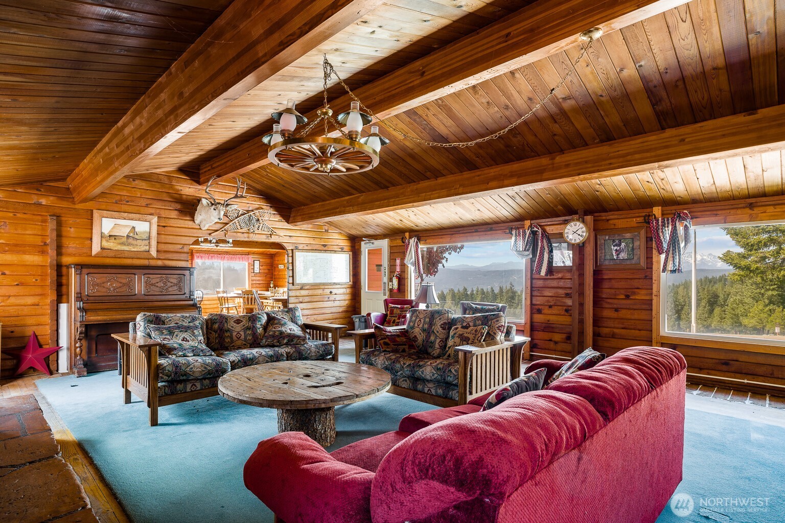 20 Skull Springs Road Cle Elum, WA 98922 - Photo 32 of 35 a living room with furniture fireplace and a large window