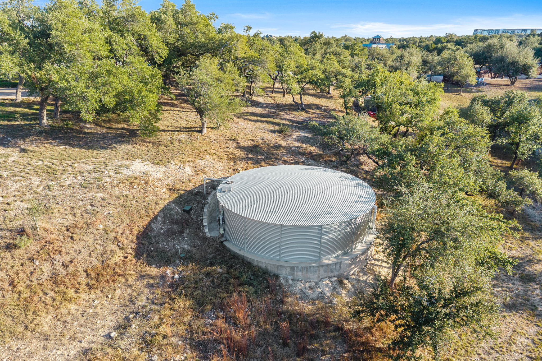 447 Winning Colors Austin, TX 78737 - Photo 35 of 40 40,000 gallon rainwater collection system + good production water well ensures great water for years to come...