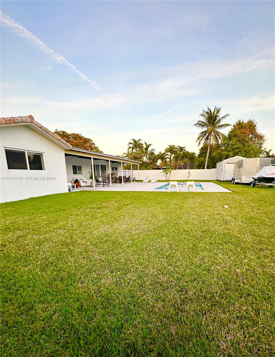 9230 Southwest 68th Street Miami, FL 33173 - Photo 25 of 29 a view of an ocean with a big yard