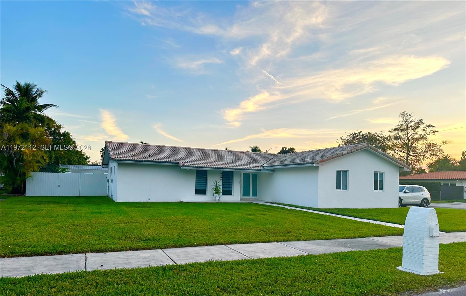 9230 Southwest 68th Street Miami, FL 33173 - Photo 29 of 29 a view of a house with a backyard