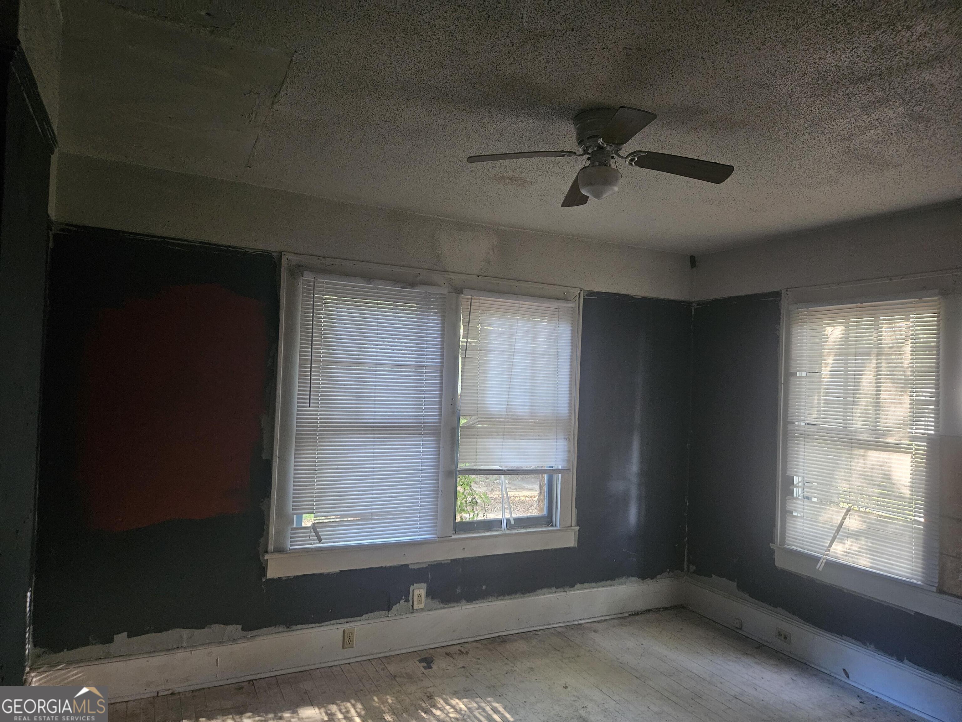 604 Hicks Street Waycross, GA 31501 - Photo 4 of 10 a view of an empty room with a window
