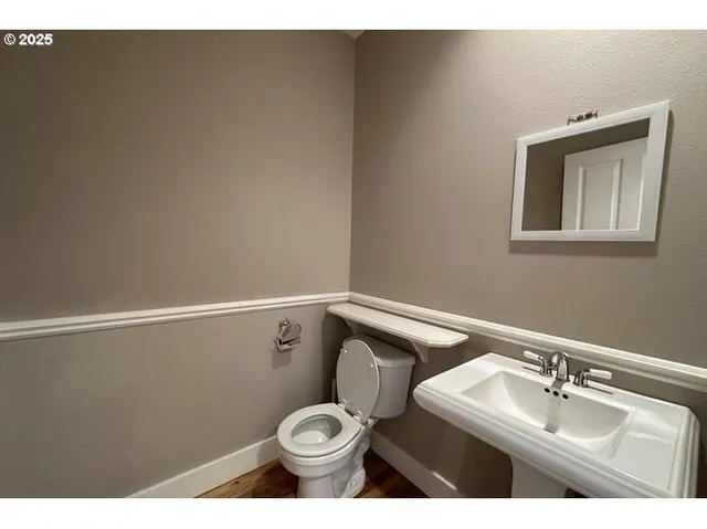 a bathroom with a sink and a toilet