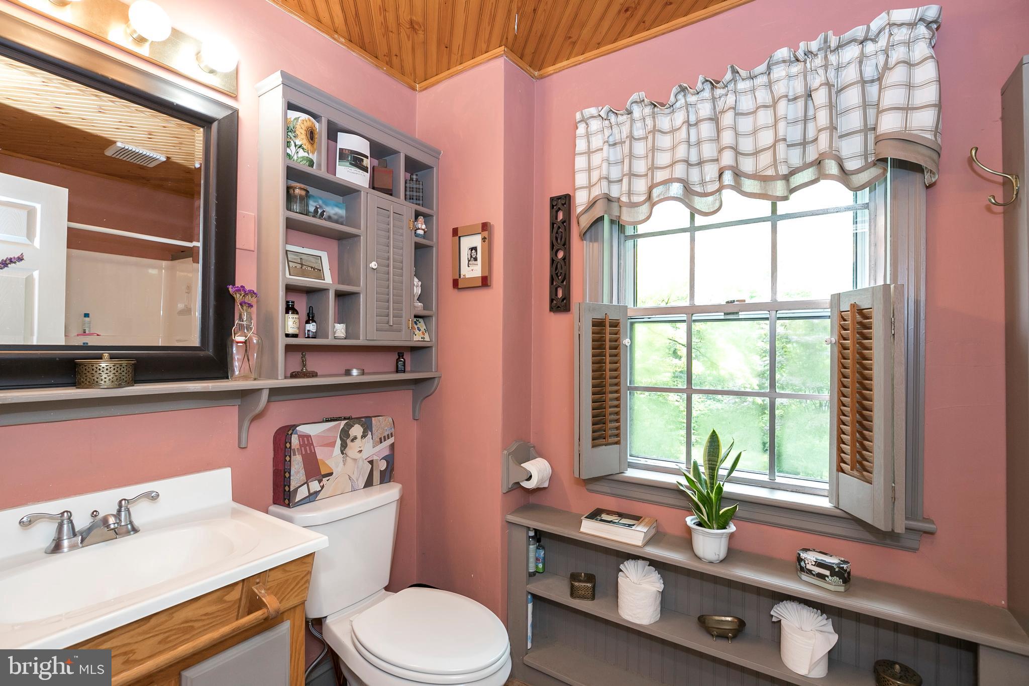 340 Norwood Road Downingtown, PA 19335 - Photo 26 of 36 Cottage Style Decor in the Cheerful Hall Bath!