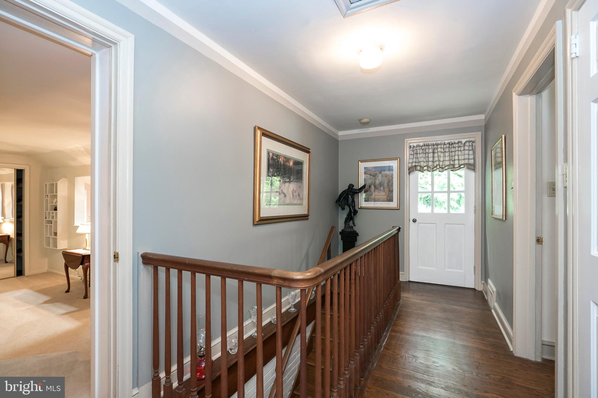 340 Norwood Road Downingtown, PA 19335 - Photo 28 of 36 Wood Floored Hall leads to the Upper Rear Deck!