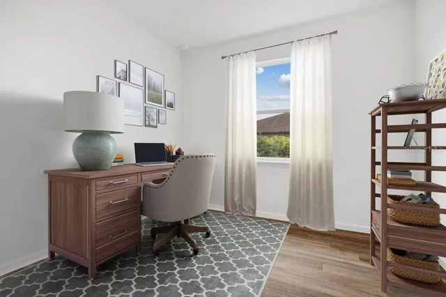 a view of workspace with wooden floor outdoor view