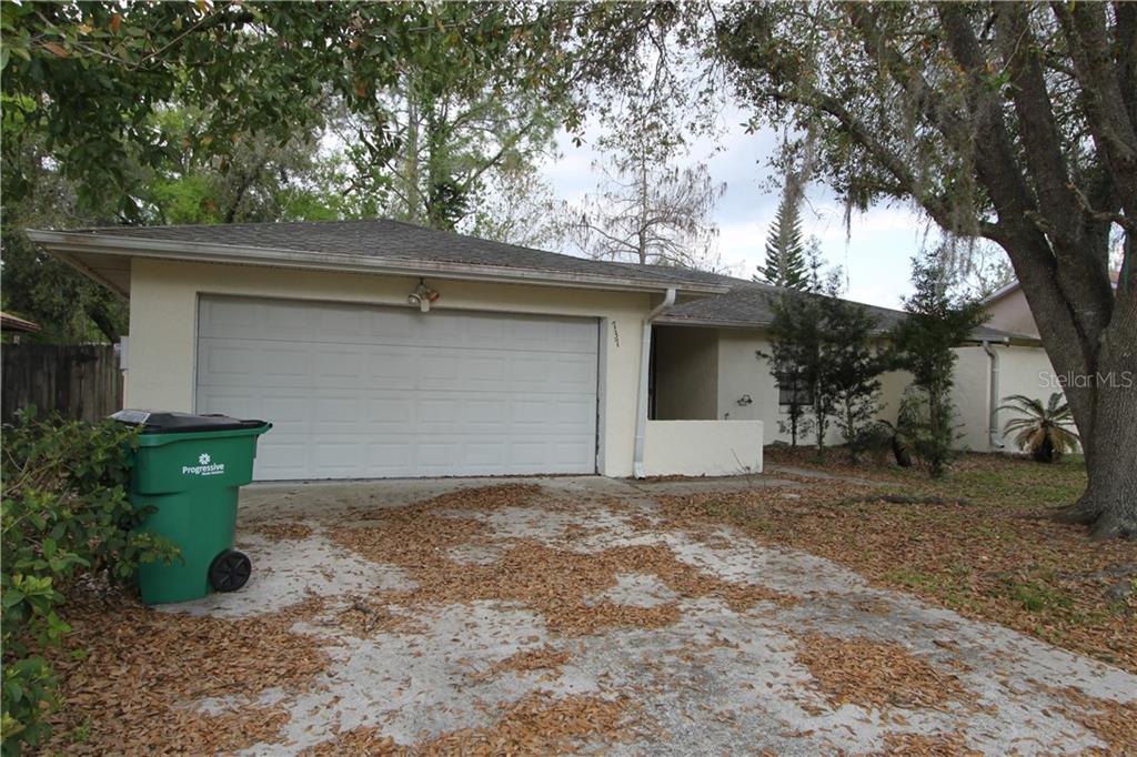737 Del Rio Way Kissimmee, FL 34758 - Photo 1 of 1 a house with a tree in front of it