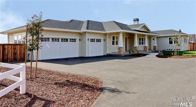 454 School Road Novato, CA 94945 - Photo 1 of 1 a front view of a house with a yard and garage