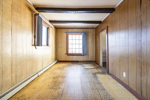 a view of an empty room and window