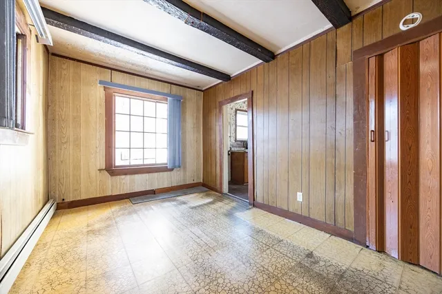 an empty room with windows