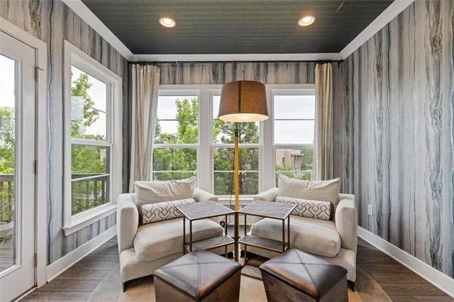 a view of a balcony with wooden floor