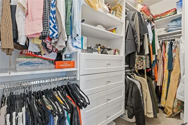 a bathroom with double sink and a mirror
