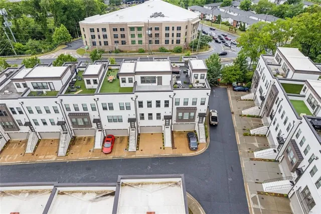 an aerial view of a house with a garden