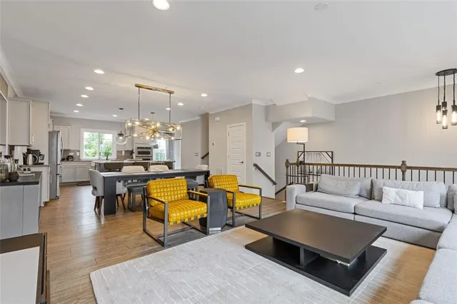 a large kitchen with a table and chairs