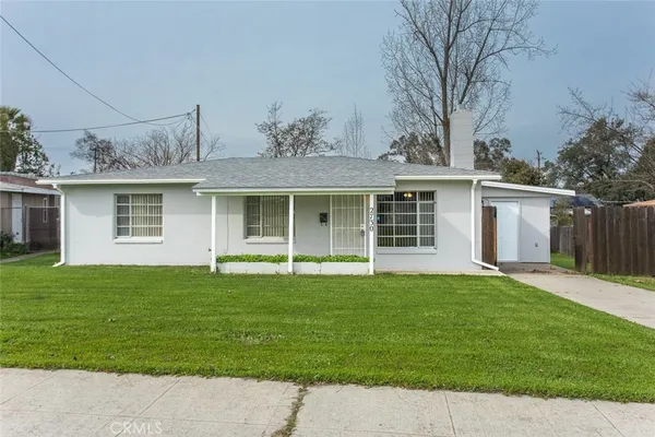 front view of a house with a yard