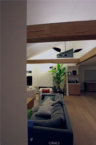 a kitchen with stainless steel appliances granite countertop a sink a stove and refrigerator