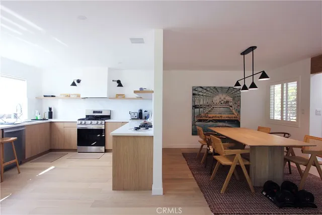 a view of a patio with a yard