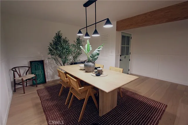 a kitchen with stainless steel appliances a sink dishwasher stove and white cabinets