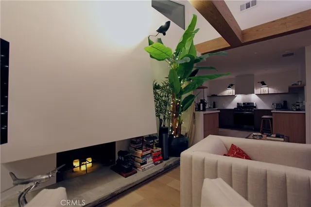 a kitchen with stainless steel appliances a cabinets and stove top oven