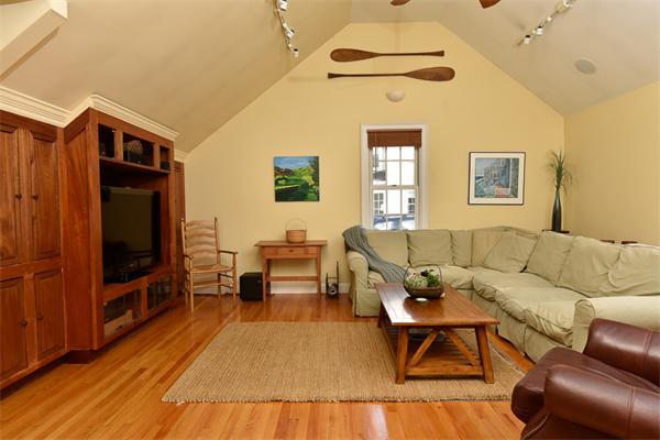 25 Chesterfield Road Milton, MA 02186 - Photo 16 of 27 a living room with furniture and a flat screen tv