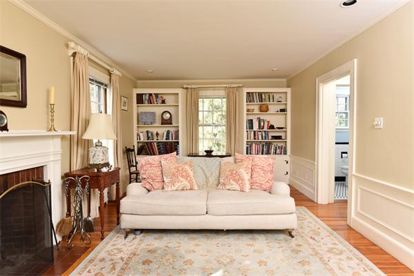 25 Chesterfield Road Milton, MA 02186 - Photo 4 of 27 a living room with furniture and a fireplace