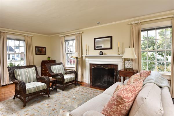 25 Chesterfield Road Milton, MA 02186 - Photo 5 of 27 a living room with furniture and a fireplace