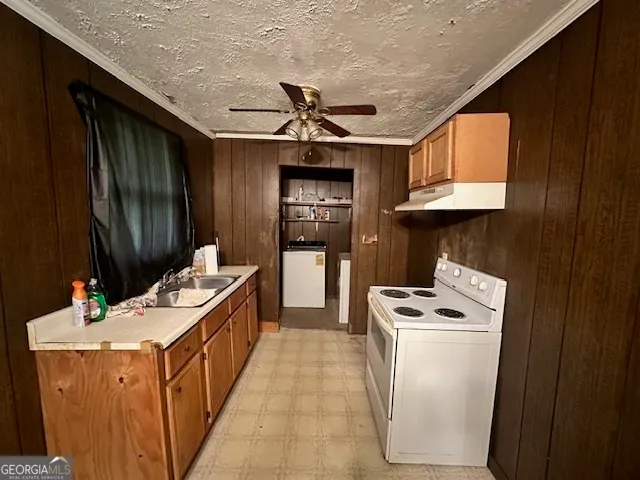 a kitchen that has a lot of cabinets in it
