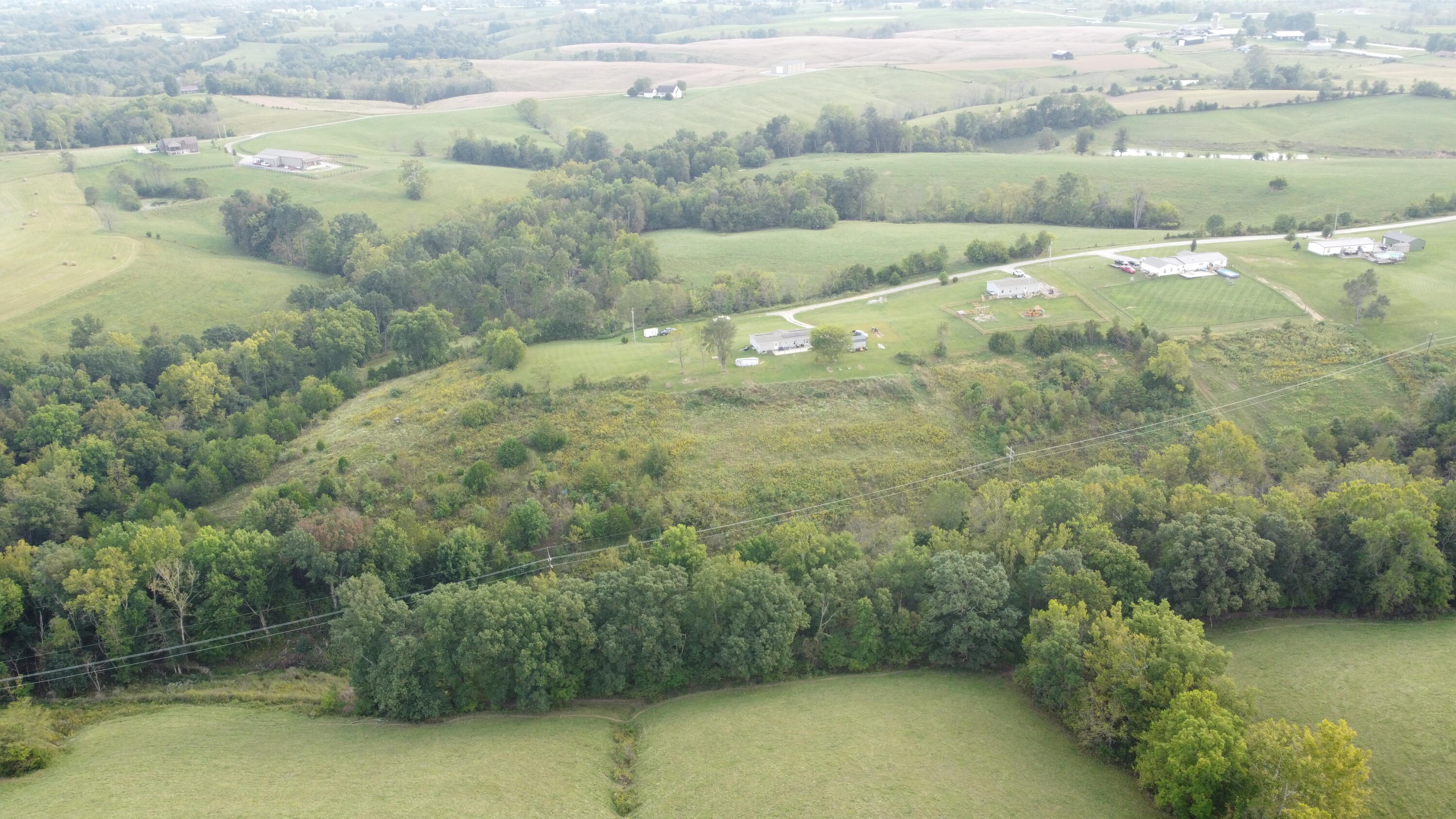 505 Tackett Road Sparta, KY 41086 - Photo 7 of 28 dji_fly_20260920_175222_105_178994141820