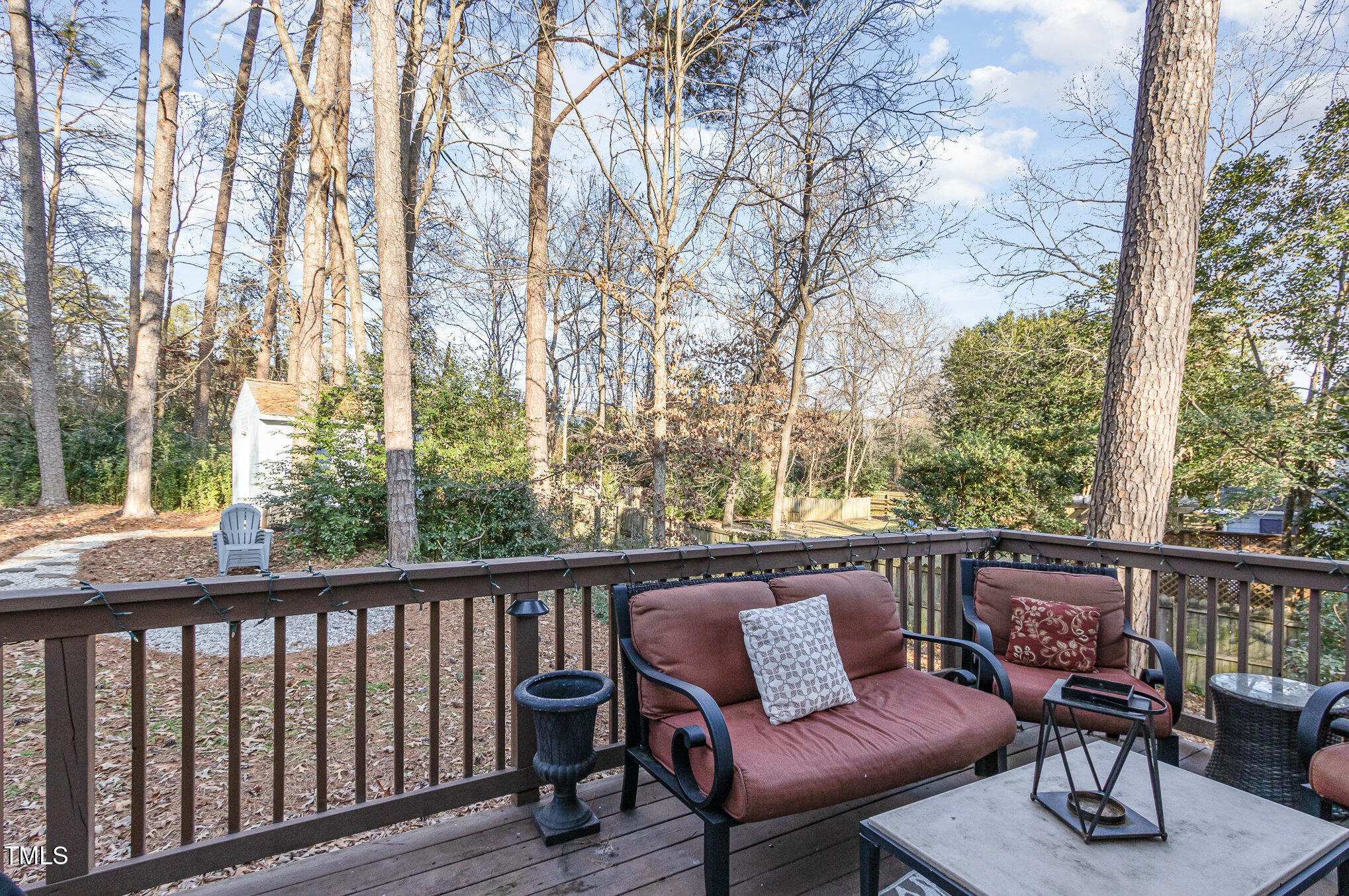 401 Rosehaven Drive Raleigh, NC 27609 - Photo 24 of 26 Deck overlooking the wooded backyard