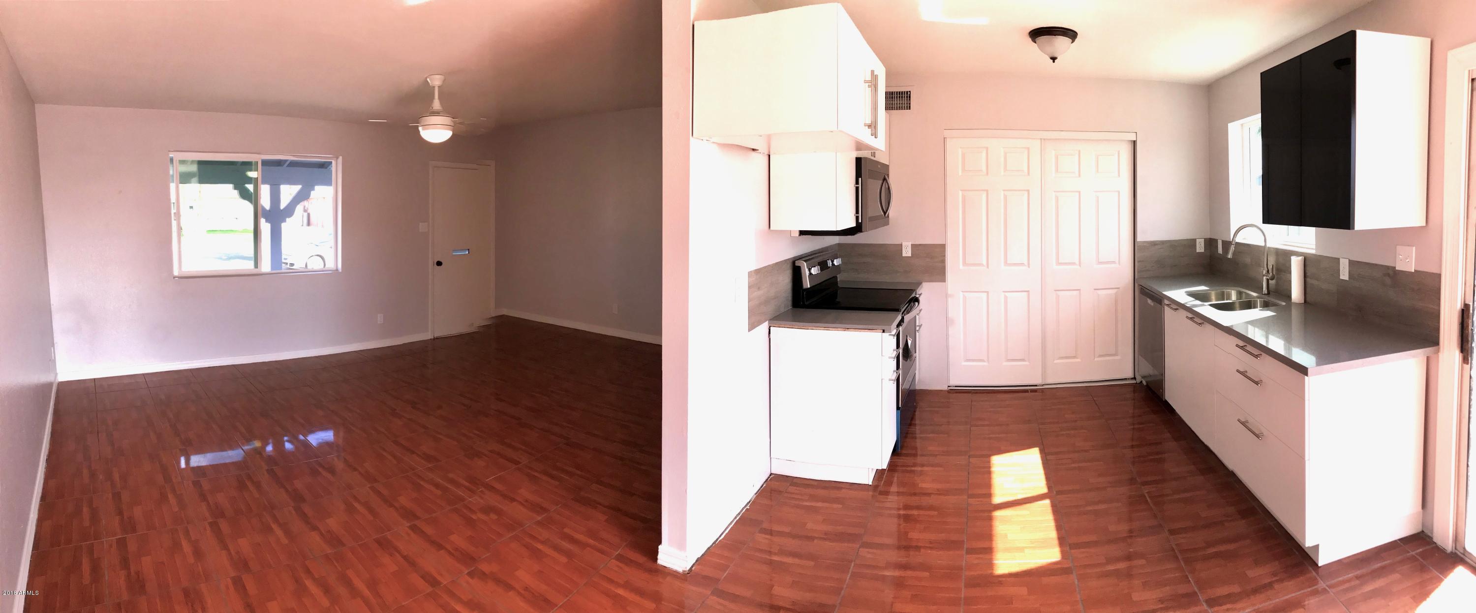 7613 West Osborn Road Phoenix, AZ 85033 - Photo 4 of 13 Kitchen view & living room
