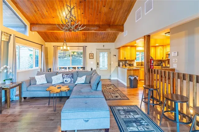 a living room with furniture and a table