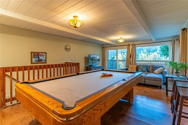 a bedroom with a bed and a table in it