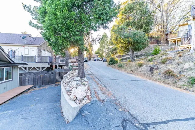 a view of road and trees