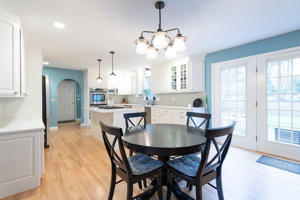 42 Willard Road Weston, MA 02493 - Photo 4 of 25 a view of a dining room with furniture window and wooden floor