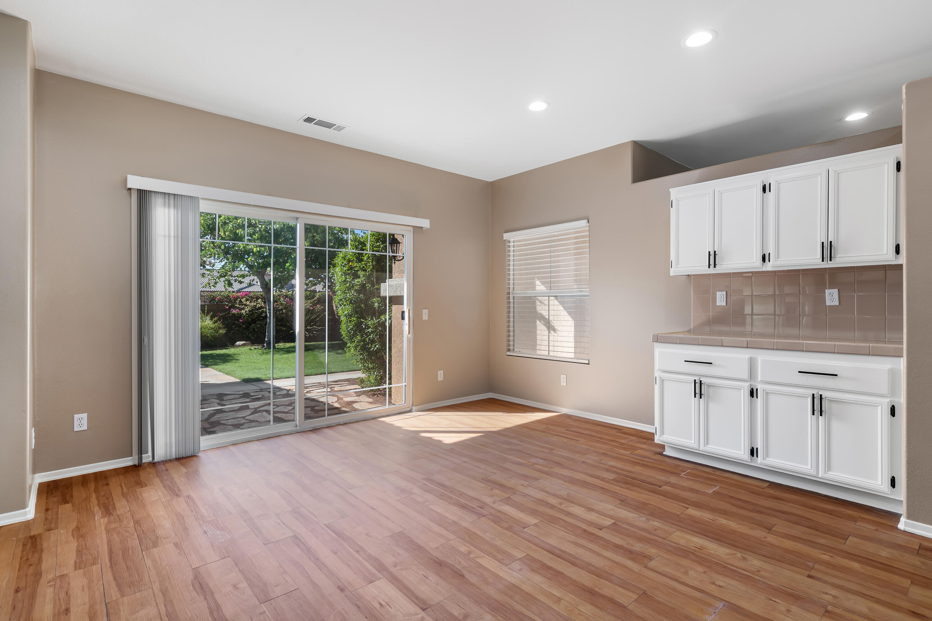 83160 Shadow Hills Way Indio, CA 92203 - Photo 18 of 50 a view of a kitchen with wooden floor and a sink